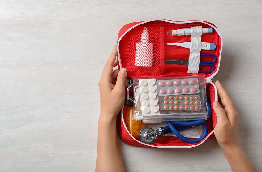 A red travelling bag for medicines