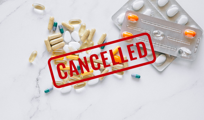 Canceled label, medicines in background