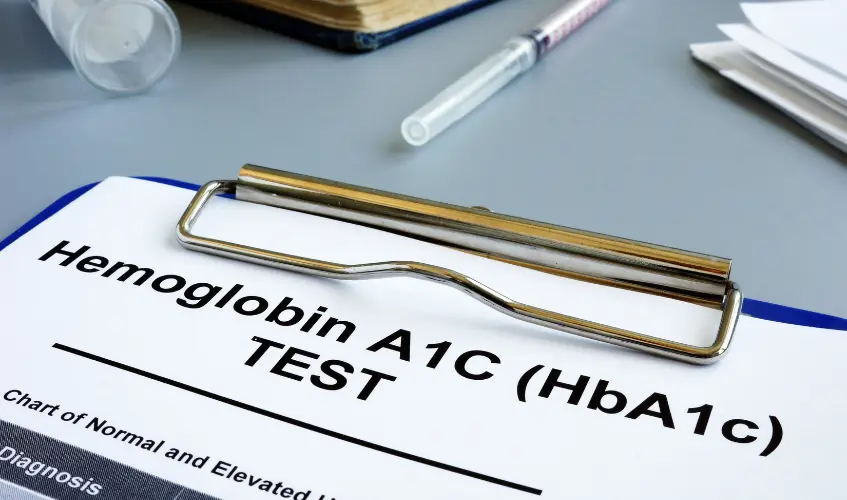 Hemoglobin A1C HbA1c Test form on desk.